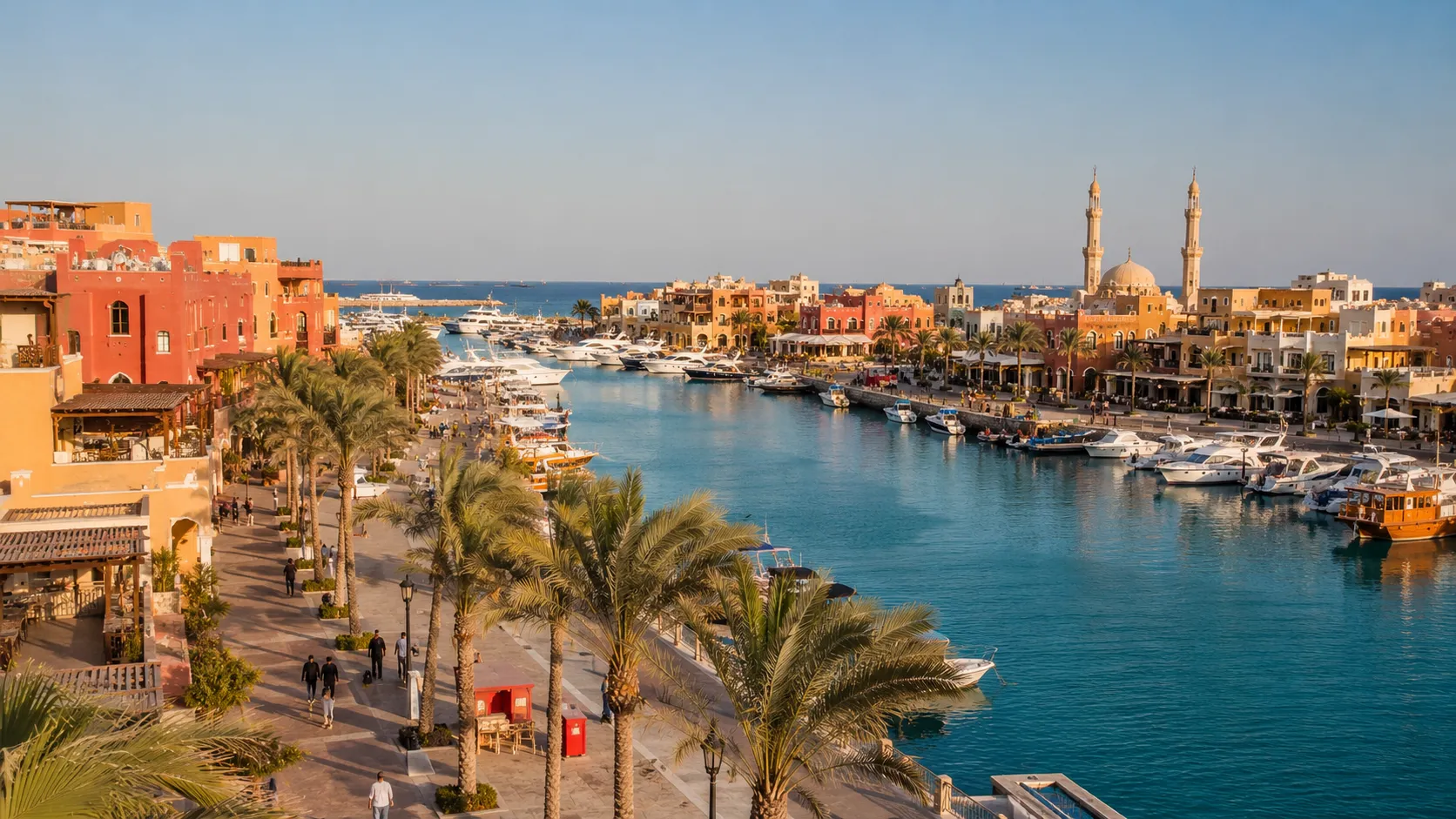 The Hurghada marina at golden hour, yachts and speedboats moored along the promenade